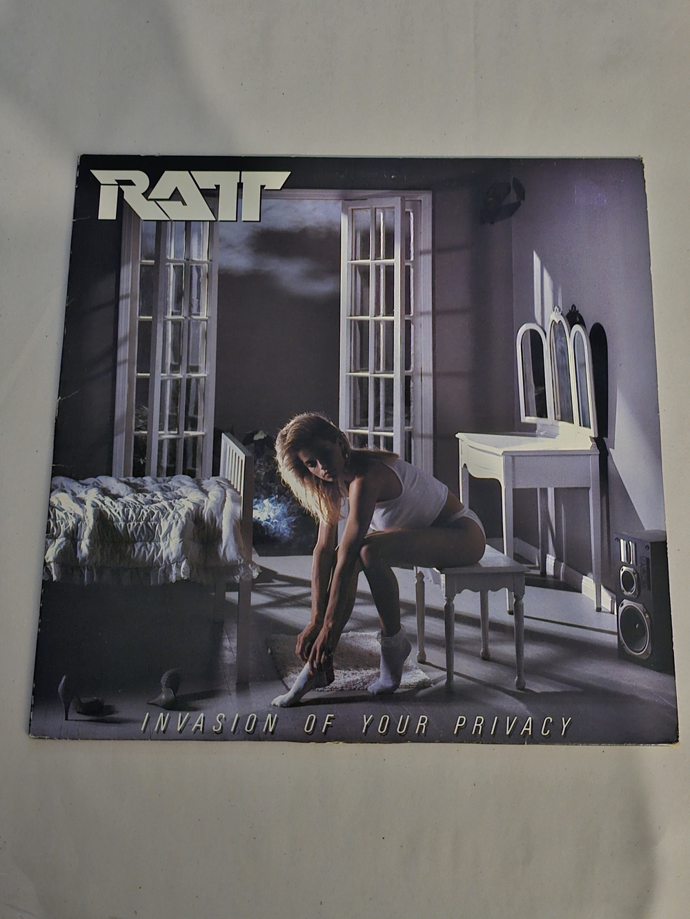 RATT "Invasion of Your Privacy" Album Cover - Purple Artwork